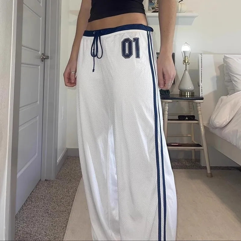 Model wearing the white Wide-Leg Athletic Pants 