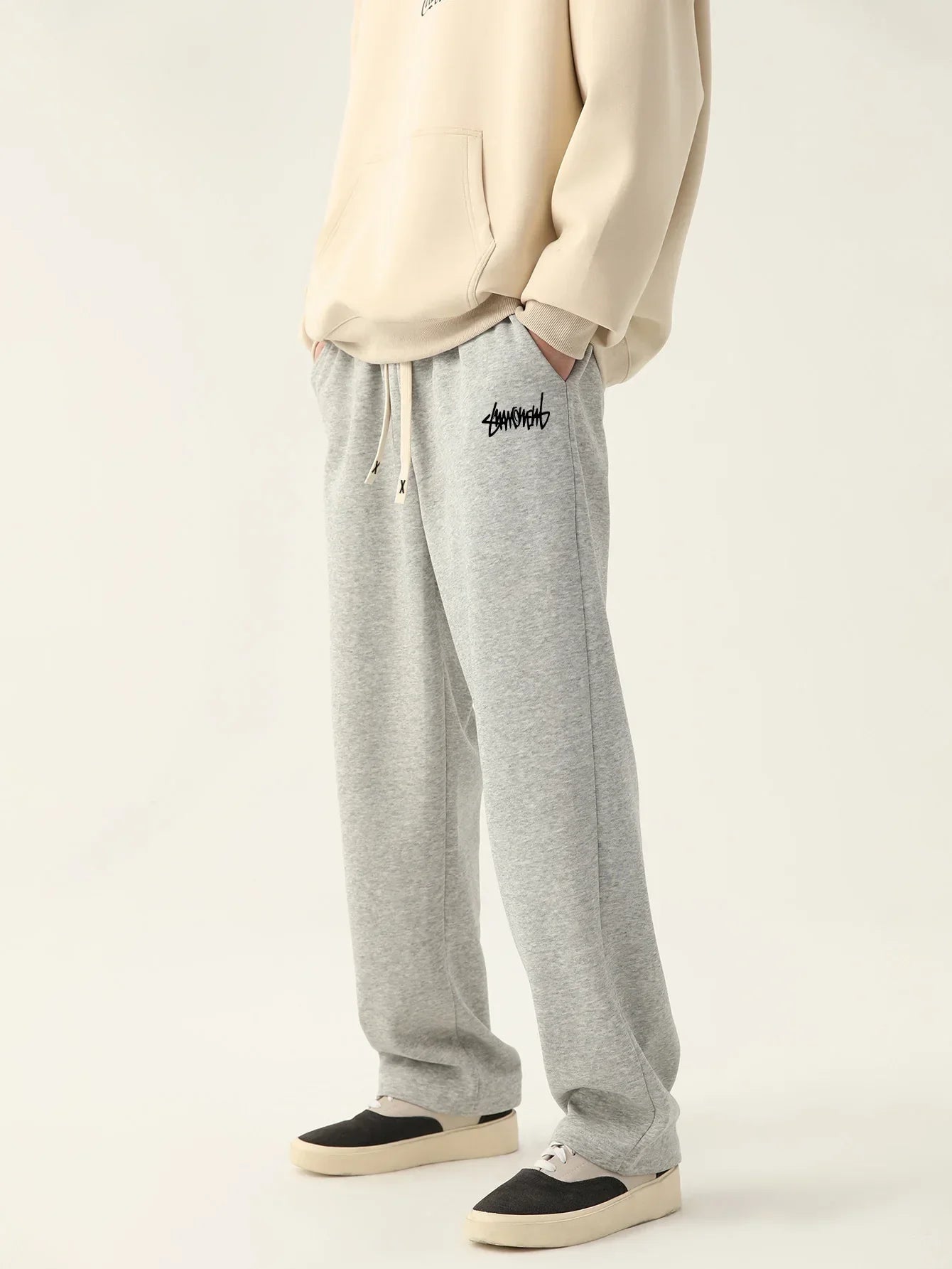 Model wearing the gray Casual Relaxed Fit Sweatpants