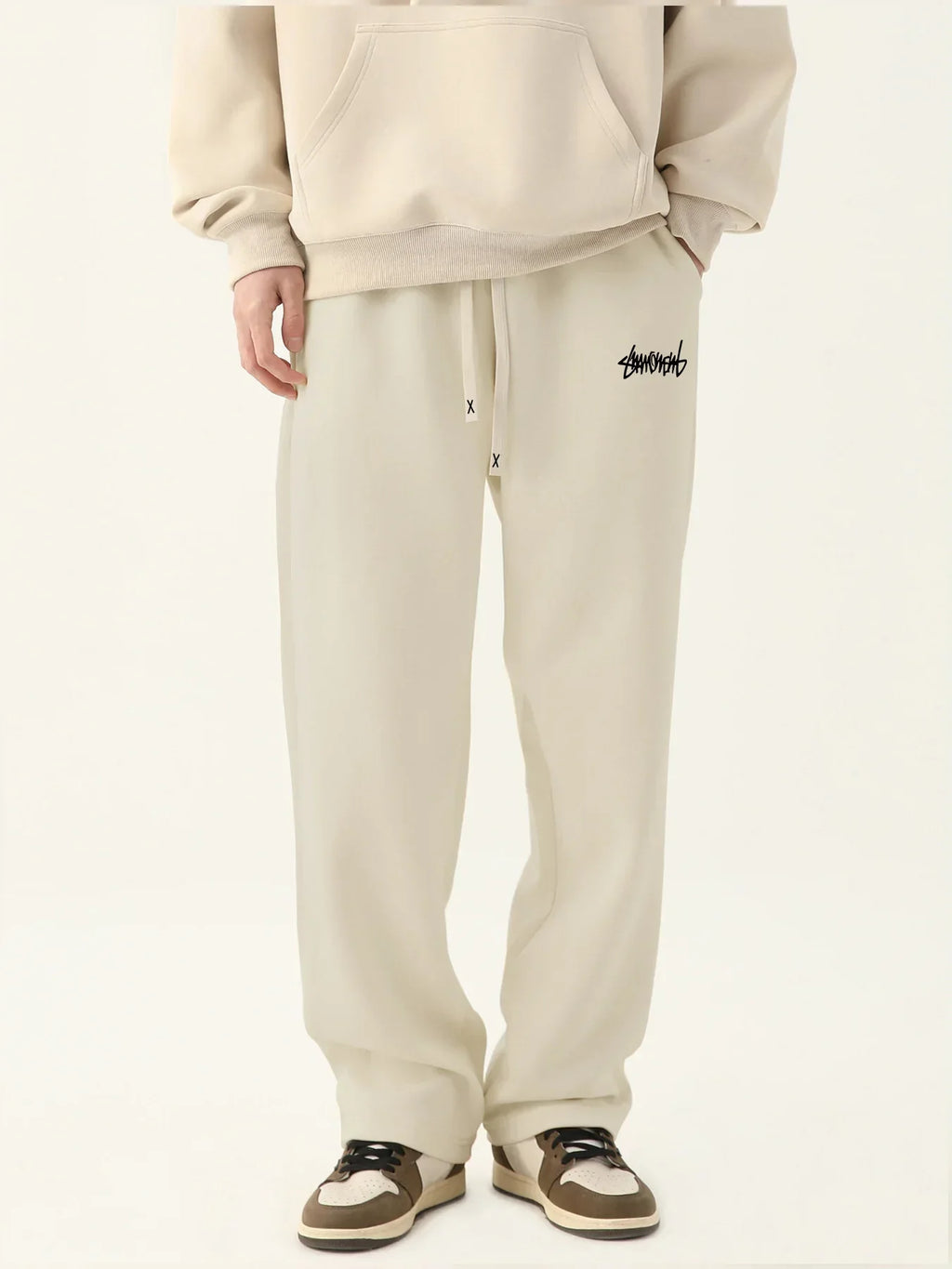 Model wearing the khaki Casual Relaxed Fit Sweatpants